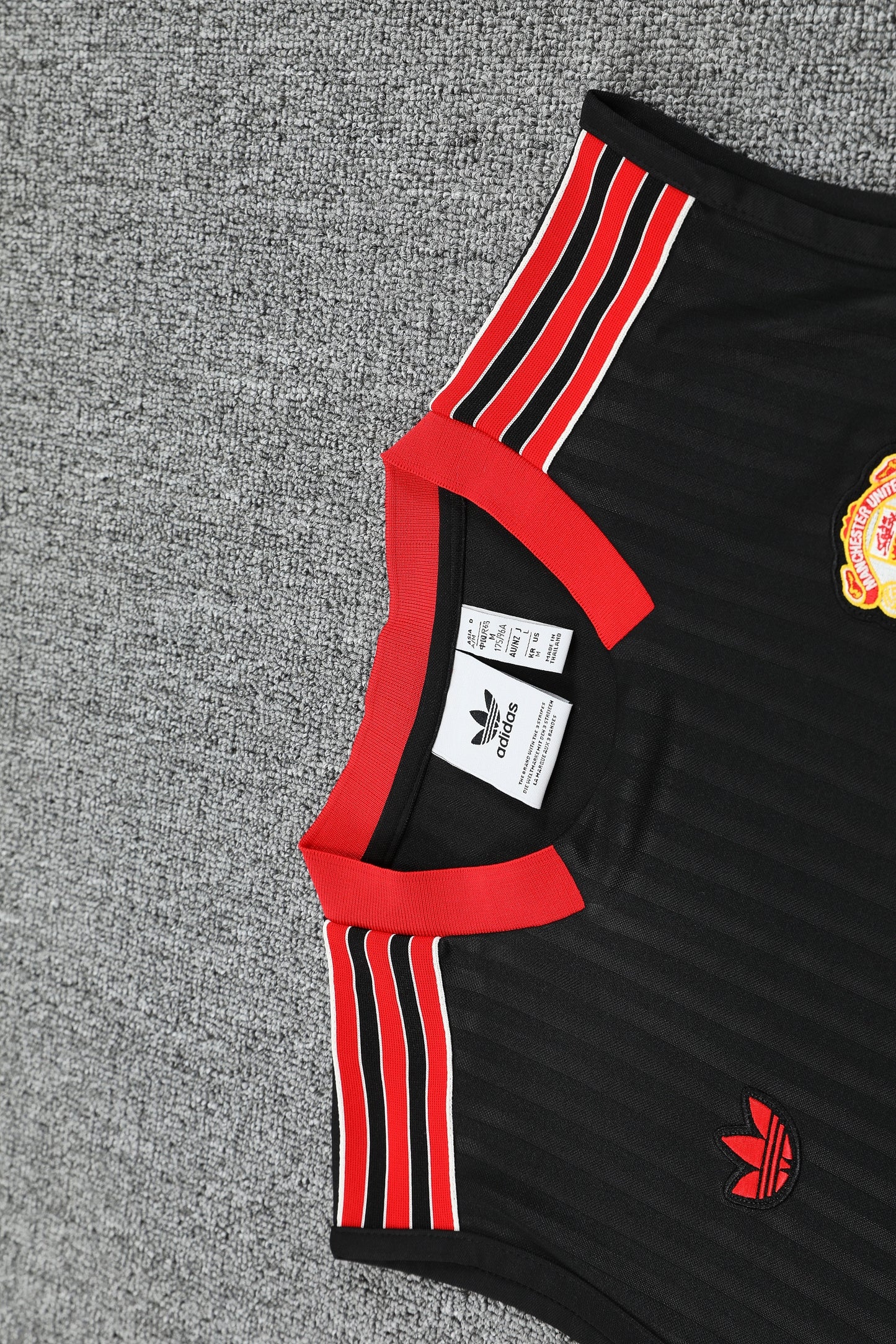Manchester United  Sleeveless Training Kit Black stripes